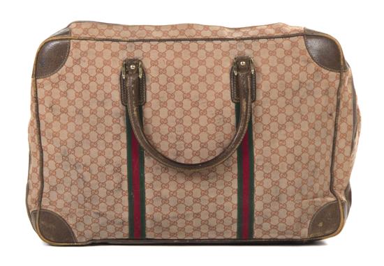 A Gucci Red Monogram Canvas
