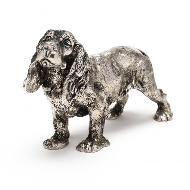 A GUCCI SILVERPLATE MODEL OF A