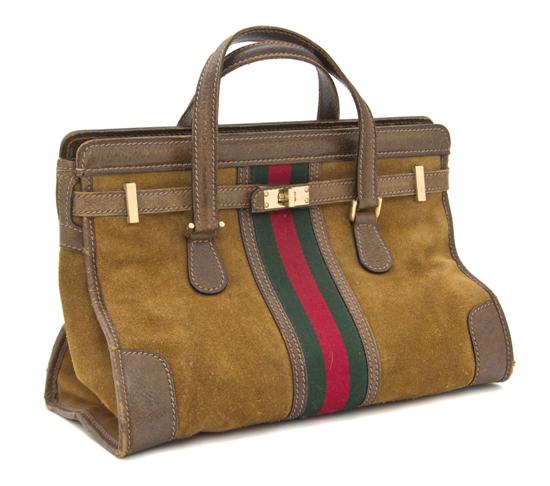 A Gucci Tan Suede Bag. Stamped: