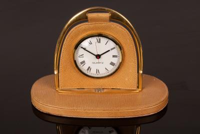 A Gucci travelling clock, the frame