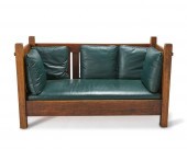 A GUSTAV STICKLEY OAK SETTLE,