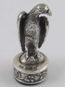 A hallmarked silver seal set with
