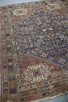 A Hamadan rug with central blue