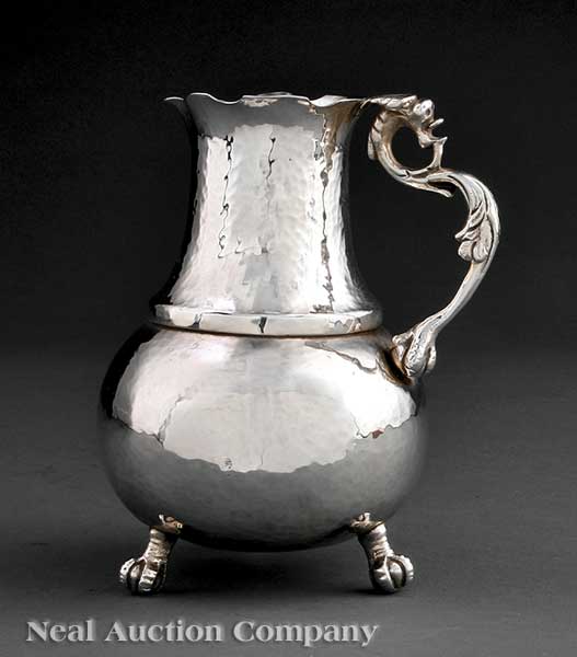 A Hammered Silverplate Water