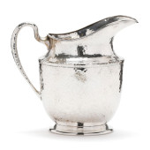 A HAND HAMMERED SILVER-PLATED