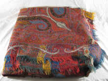 A hand woven and embroidered