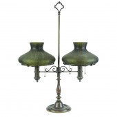 A HANDEL PATINATED BRONZE ADJU