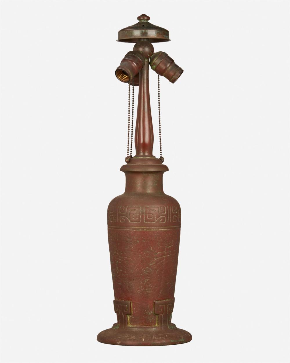 A HANDEL PATINATED METAL TABLE LAMP