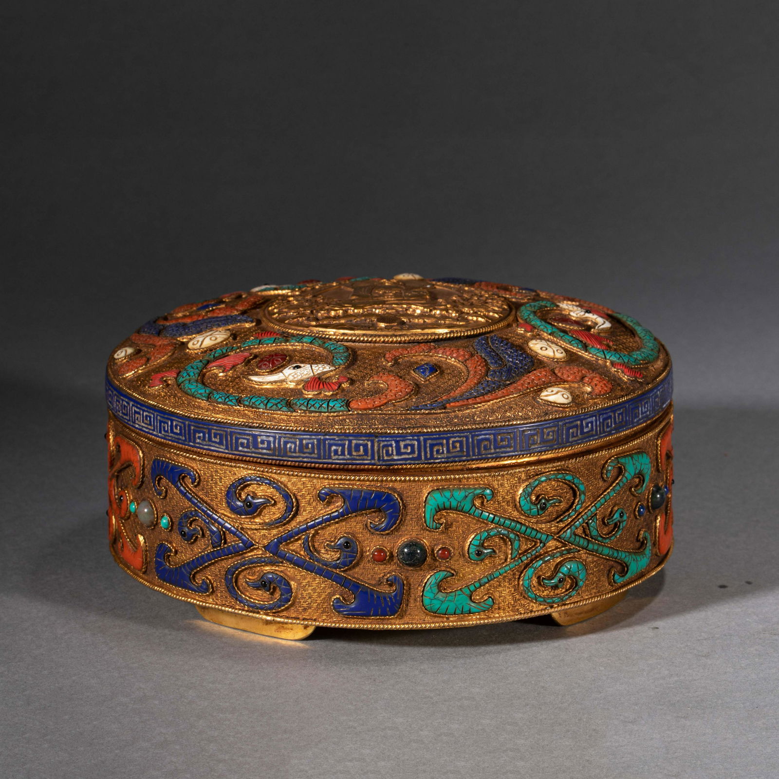 A HARDSTONES INLAID GILT BRONZE BOX