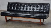 A HARDWOOD FRAMED FAUX BLACK L