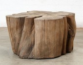 A HARDWOOD TRUNK SECTION PEDES