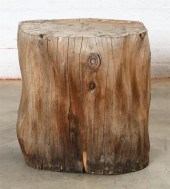 A HARDWOOD TRUNK SECTION PEDES