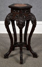A heavily carved vintage Chinese