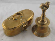 A heavy brass bell with sacred bull