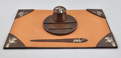 A Heintz Sterling on Bronze Desk