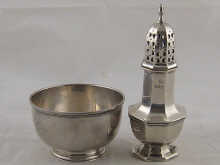 A hemispherical silver bowl