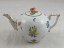 A Herend miniature teapot with rose