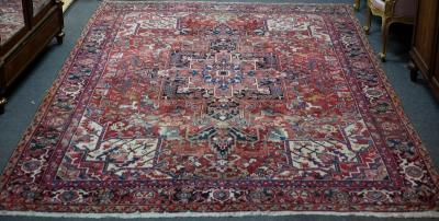 A Heriz carpet of geometric design,
