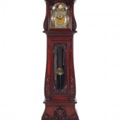 A Herschede Carved Mahogany Ni