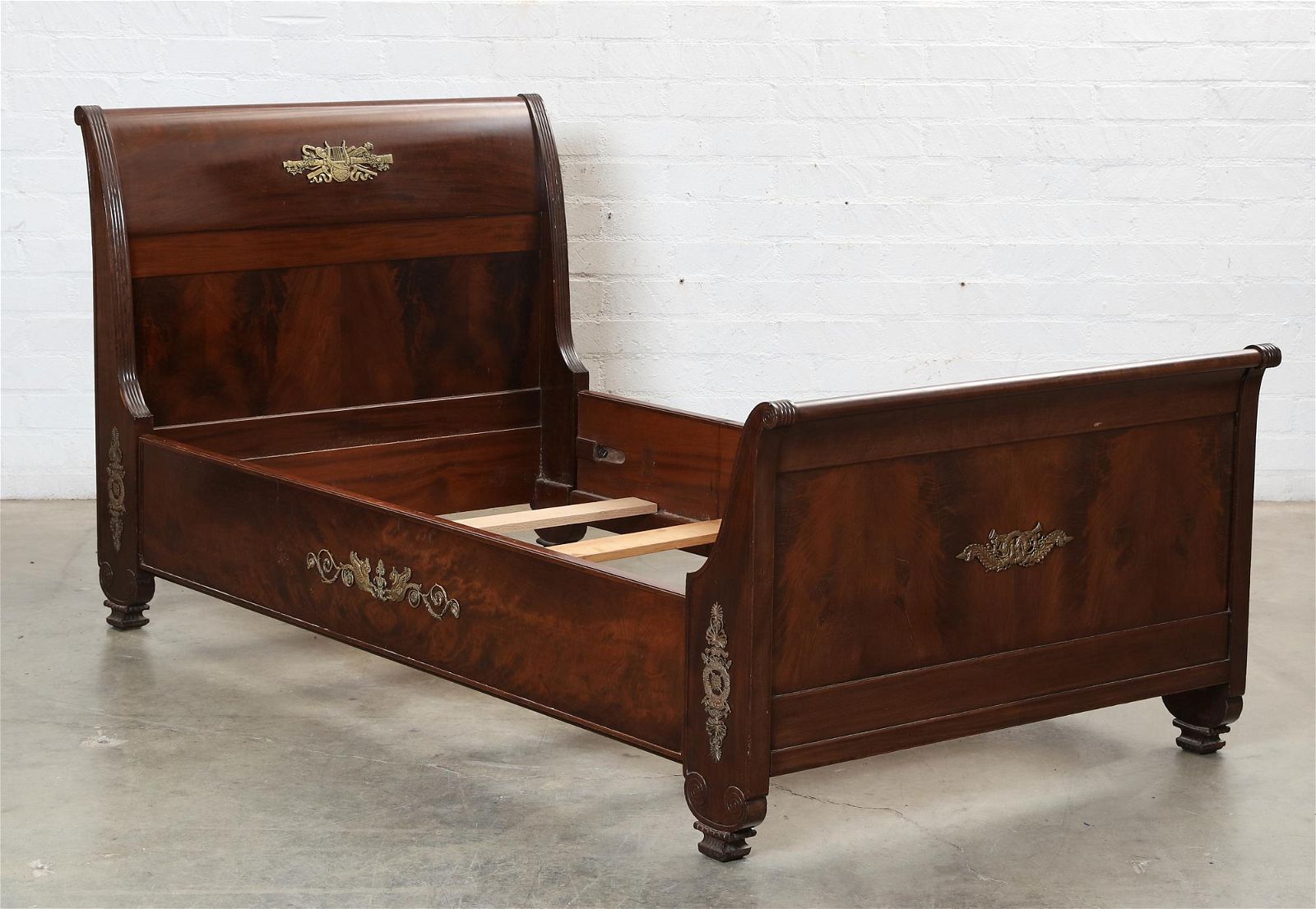 A HERTER BROTHERS MAHOGANY SLEIGH