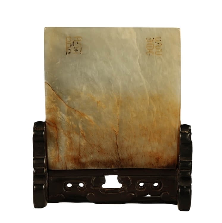 A HETIAN JADE CARVED 'FIGURES'