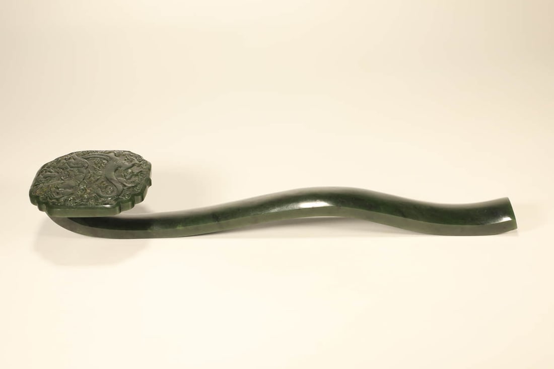 A HETIAN JADE 'DRAGON' RUYI
