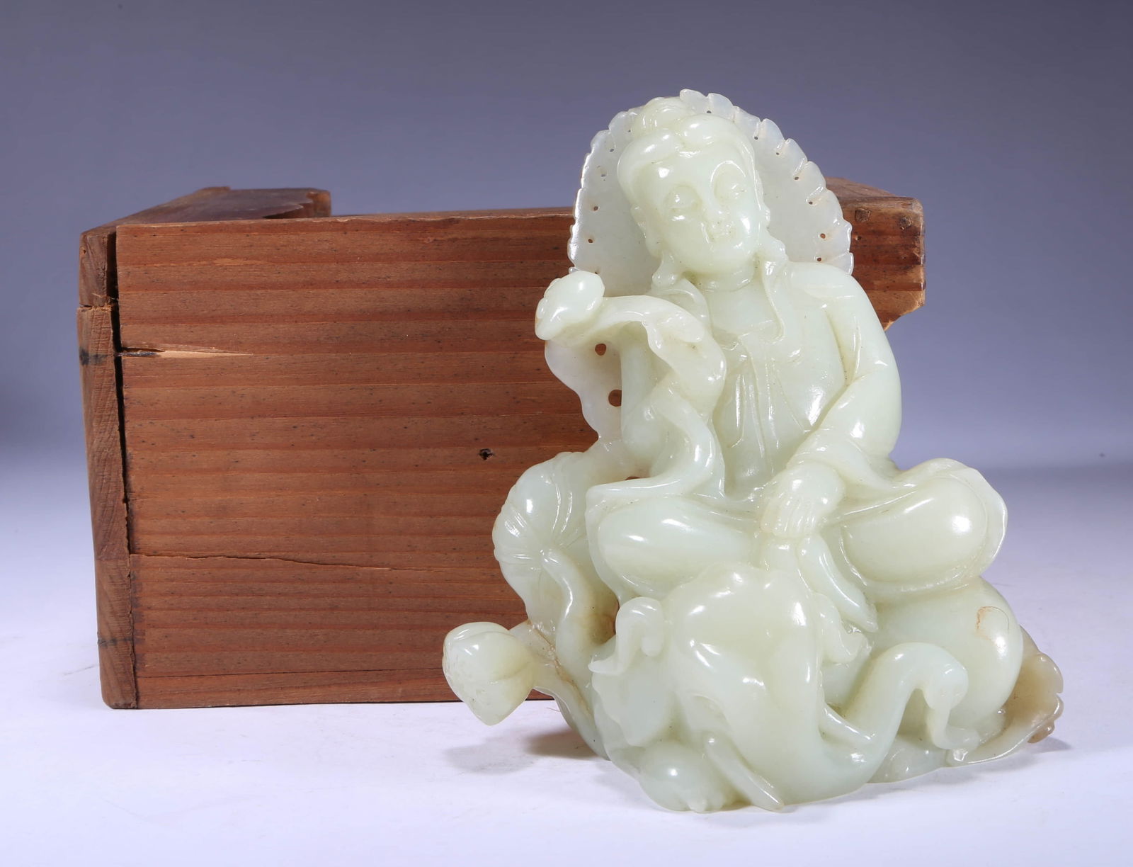 A HETIAN JADE GUANYIN STATUETTEA