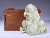 A HETIAN JADE GUANYIN STATUETT