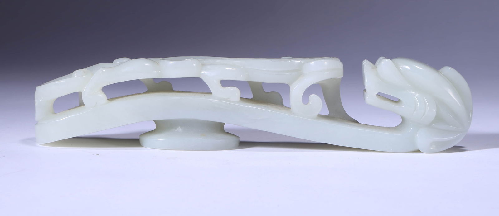 A HETIAN JADE RUYI STATUETTEA