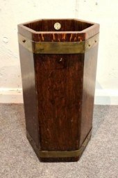 A hexagonal oak stick stand, b