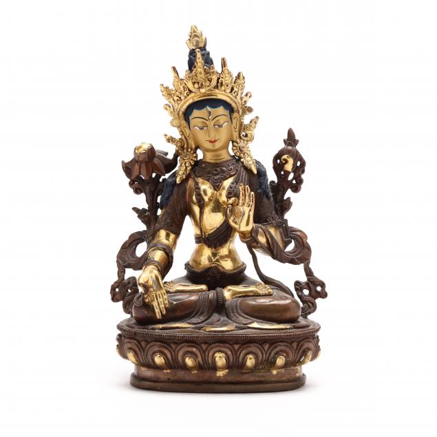 A HIMALAYAN GILT BRONZE SCULPTURE