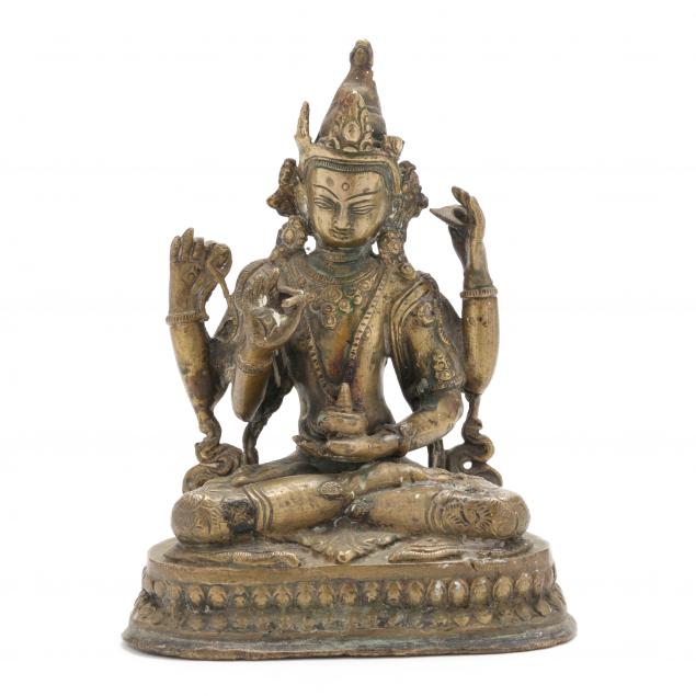 A HIMALAYAN GILT BRONZE SCULPTURE