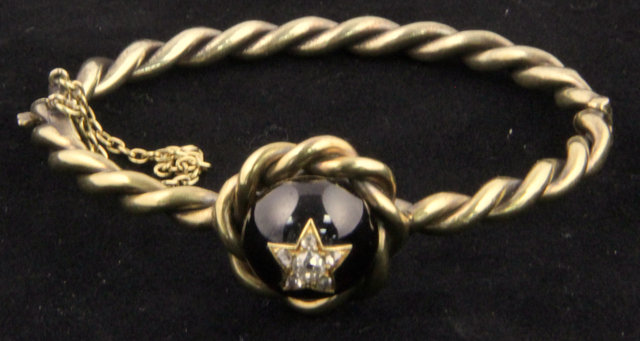A hinged gem-set bracelet of