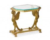 A HOLLYWOOD REGENCY BRASS SIDE
