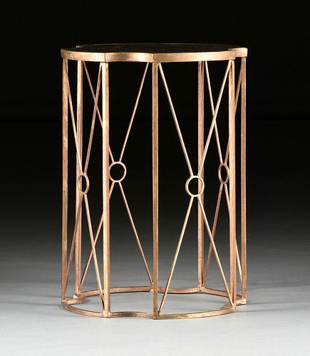 A HOLLYWOOD REGENCY STYLE MIRROR