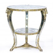A HOLLYWOOD REGENCY STYLE MIRR