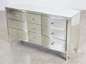 A HOLLYWOOD REGENCY STYLE MIRR