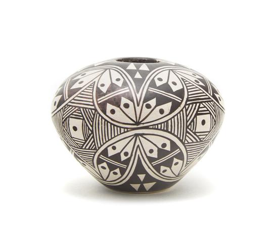 A Hopi Cream Slip Miniature Seed