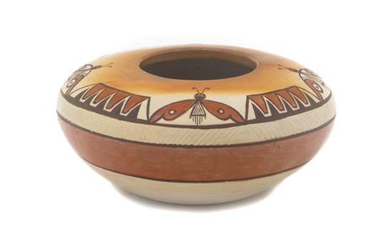 A Hopi Seed Jar having butterfly