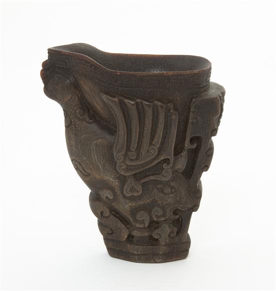 A Horn Carved Libation Cup having a