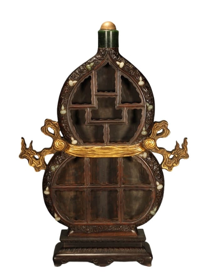 A HUALI WOOD INLAYED WITH JADE,