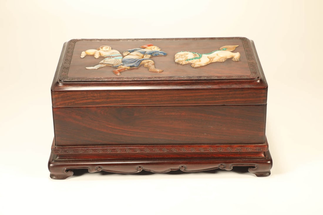 A HUANGHUALI WITH HARDSTONE
