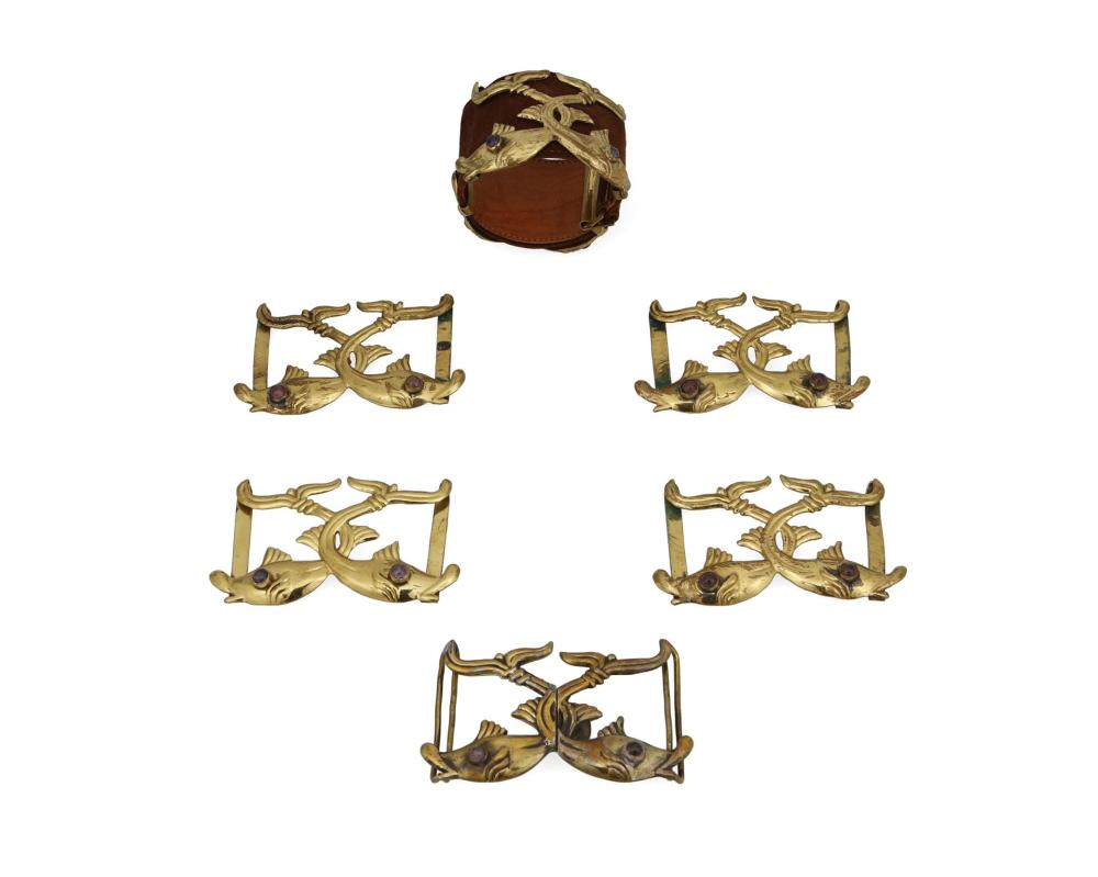 A HUBERT HARMON FISH BRACELET AND