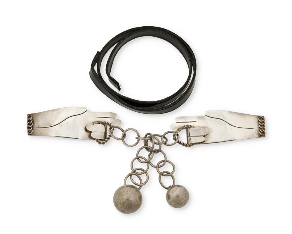 A HUBERT HARMON SILVER HAND BELT