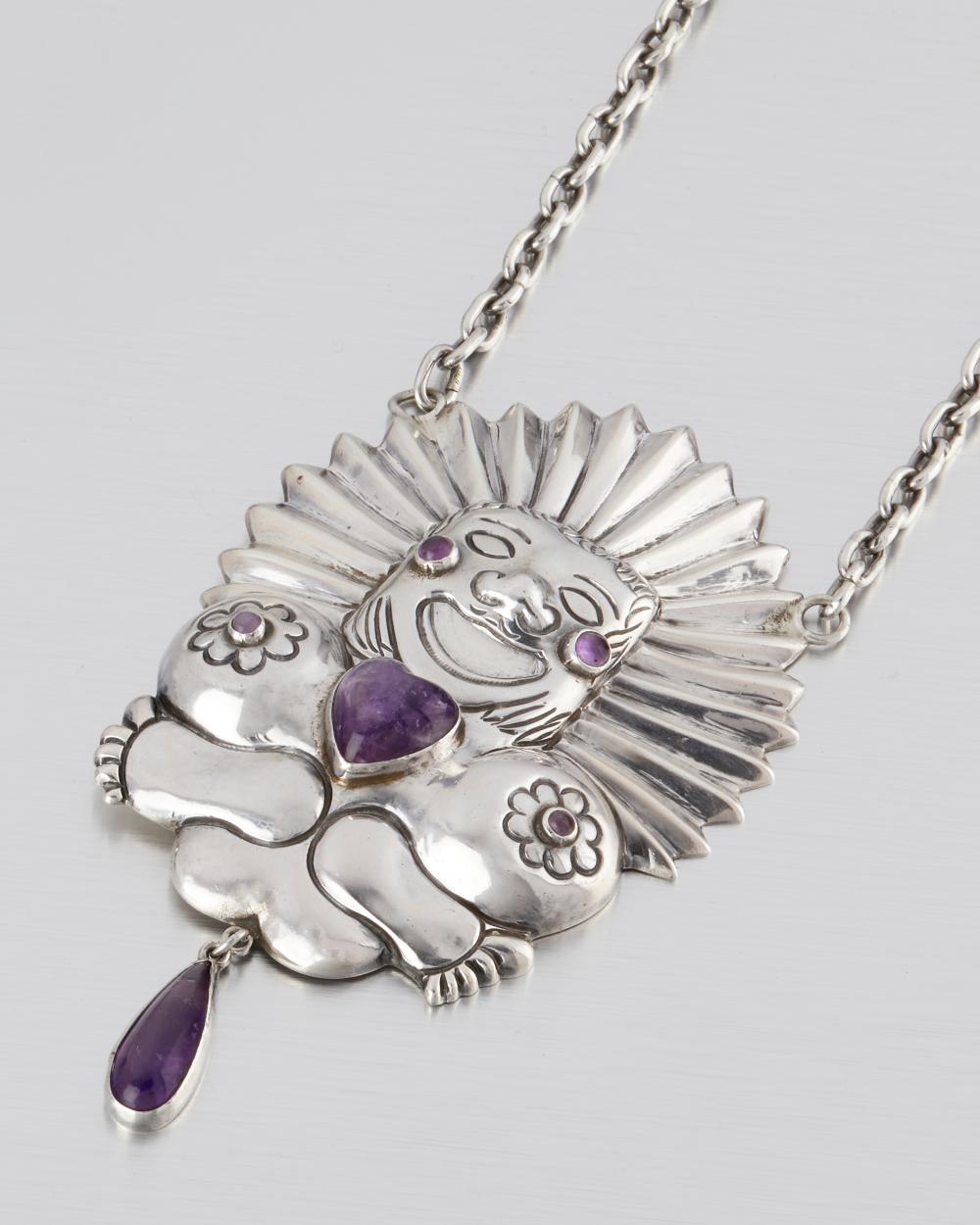 A HUBERT HARMON STERLING SILVER AND