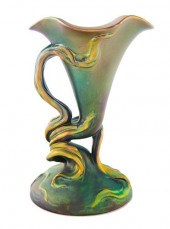 A HUNGARIAN EOSIN-GLAZED HANDL