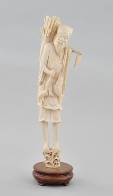 A Ivory Carving of a Standing