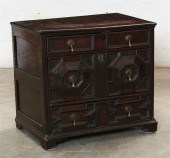 A JACOBEAN OAK CHEST OF DRAWER