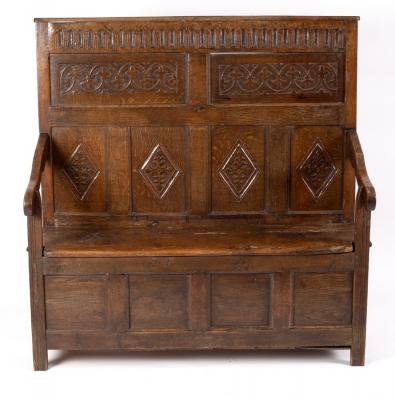 A Jacobean oak settle, the panel