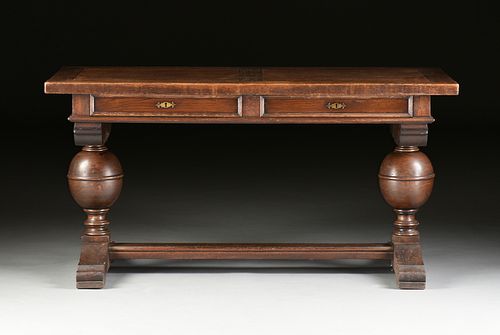 A JACOBEAN STYLE CARVED OAK LIBRARY